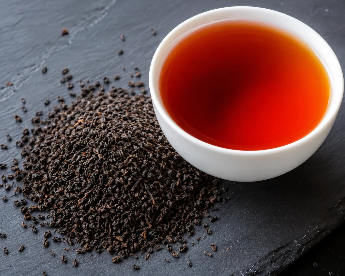 Pure Ceylon BOP Broken Orange Pekoe black tea leaves and bright coppery infusion