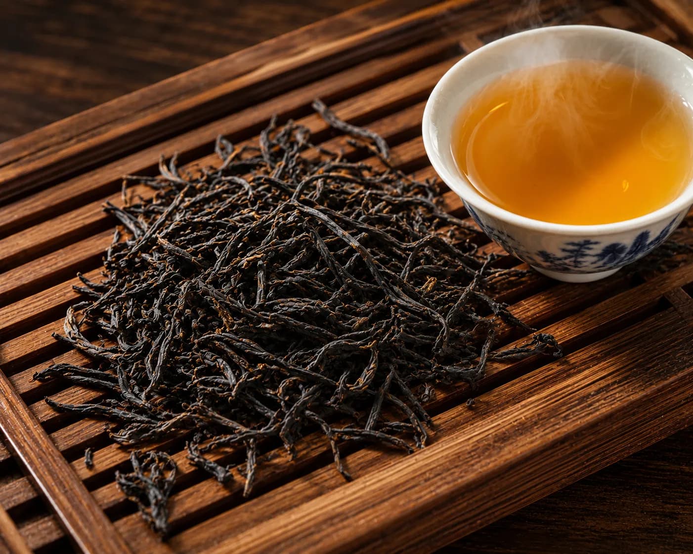 Ceylon OP Orange Pekoe tightly twisted whole black tea leaves and golden amber liquor